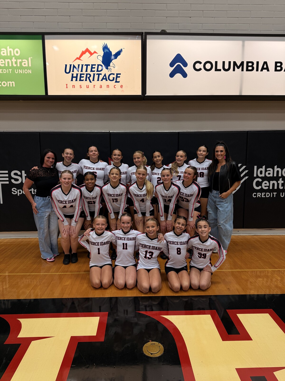 The Fierce Idaho STUNT team together on the gym floor